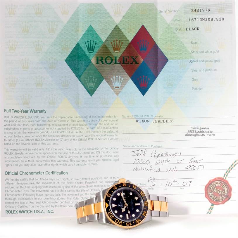 The image shows a Rolex GMT-Master 116713 Men's Stainless Steel Black Dial 116713 Men's Stainless Steel Black Dial watch laid flat with its warranty paperwork.