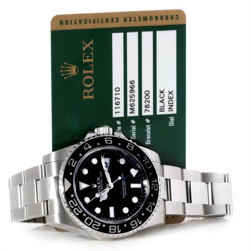 The image shows a Rolex GMT-Master 116710BKSO Men's Stainless Steel Black Dial 116710BKSO Men's Stainless Steel Black Dial watch, angled to display the face and bracelet, with a green certification card in the background.