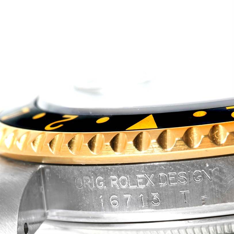 This is a close-up side angle showing the bezel, edge, and case of the Rolex GMT-Master 16713 Men's Stainless Steel Black Dial 16713 Men's Stainless Steel Black Dial, highlighting the model number 16713.