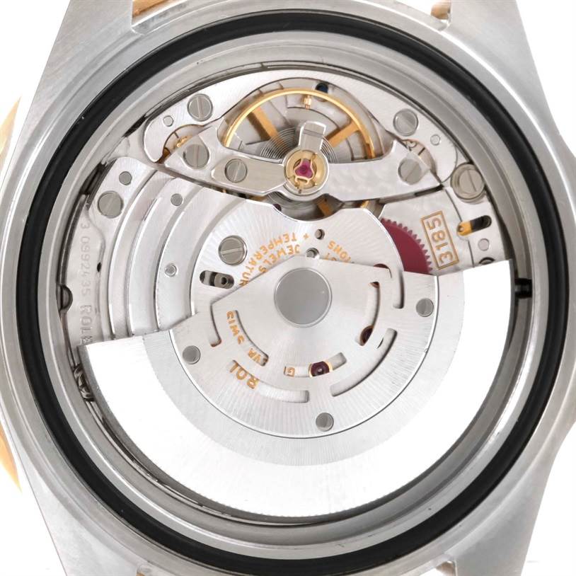 The image shows the exposed movement and internal mechanisms of a Rolex GMT-Master 16713 Men's Stainless Steel Black Dial 16713 Men's Stainless Steel Black Dial watch from the back.