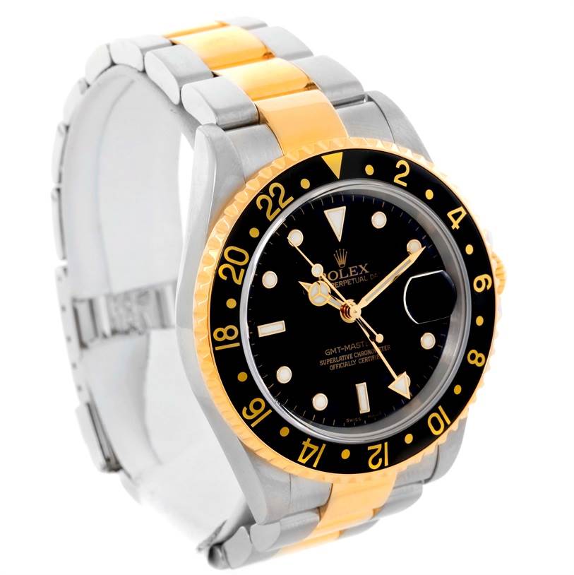 The image shows a front angle of a Rolex GMT-Master 16713 Men's Stainless Steel Black Dial 16713 Men's Stainless Steel Black Dial watch, highlighting its black dial, gold accents, and bi-color bracelet.