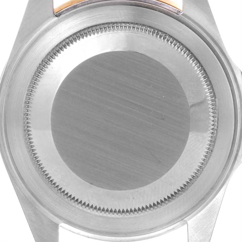 This is a close-up view of the case back of a Rolex GMT-Master 16713 Men's Stainless Steel Black Dial 16713 Men's Stainless Steel Black Dial watch.