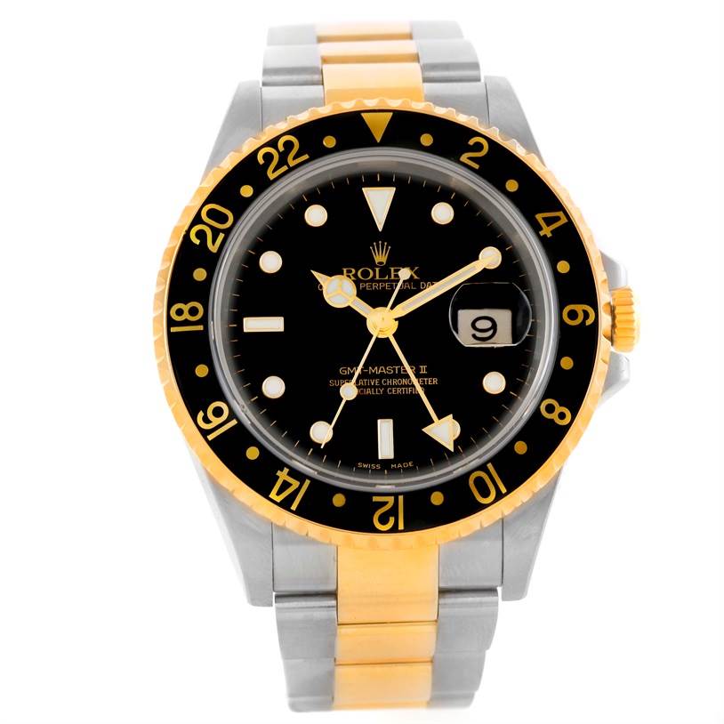 The image shows a front view of a Rolex GMT-Master 16713 Men's Stainless Steel Black Dial 16713 Men's Stainless Steel Black Dial II watch, highlighting its black dial, gold bezel, and two-tone bracelet.