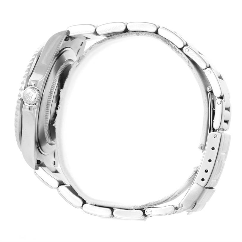 The image shows a side view of a Rolex GMT-Master 16710 Men
s Stainless Steel Black Dial 16710 Men
s Stainless Steel Black Dial watch focusing on the crown, case, and bracelet.