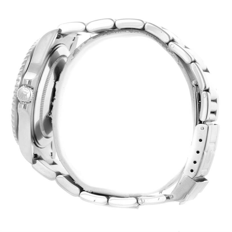 This is a side view of a Rolex GMT-Master 16710 Men's Stainless Steel Black Dial 16710 Men's Stainless Steel Black Dial watch, showing the case, bracelet, and clasp.