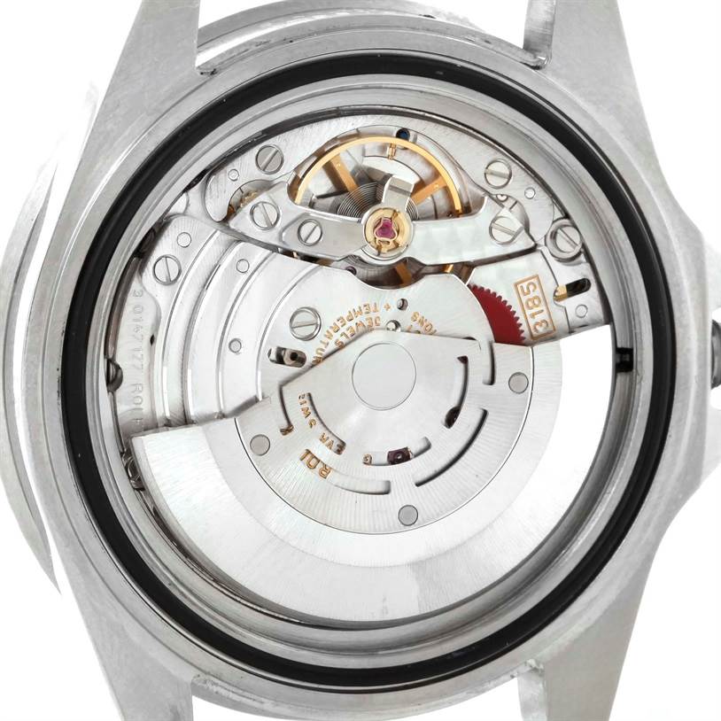 This is an interior view of a Rolex GMT-Master 16710 Men's Stainless Steel Black Dial 16710 Men's Stainless Steel Black Dial watch, showing the movement mechanism and intricate components.