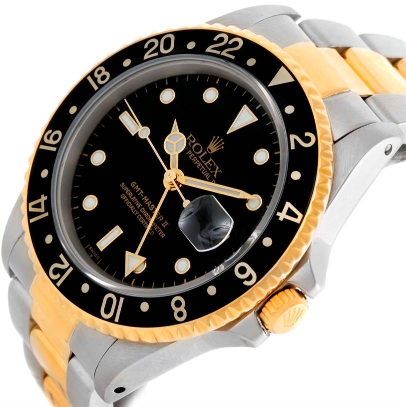 The image shows a side-angle view of the Rolex GMT-Master 16713 Men
s Stainless Steel Black Dial 16713 Men
s Stainless Steel Black Dial watch, highlighting the bezel, dial, and two-tone bracelet.