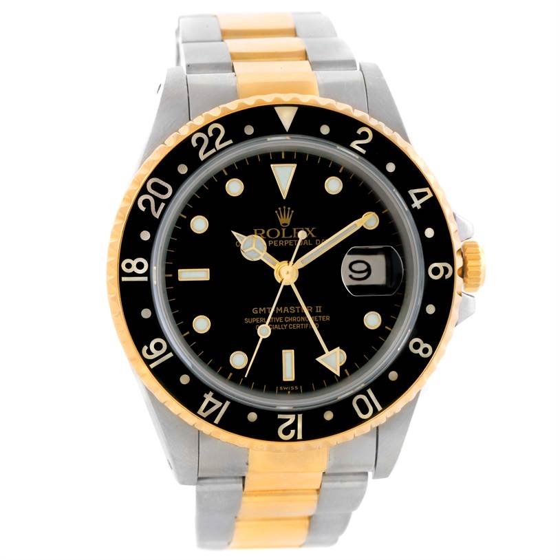 The Rolex GMT-Master 16713 Men
s Stainless Steel Black Dial 16713 Men
s Stainless Steel Black Dial watch is shown from the front, displaying the dial, bezel, and part of the stainless steel and gold strap.
