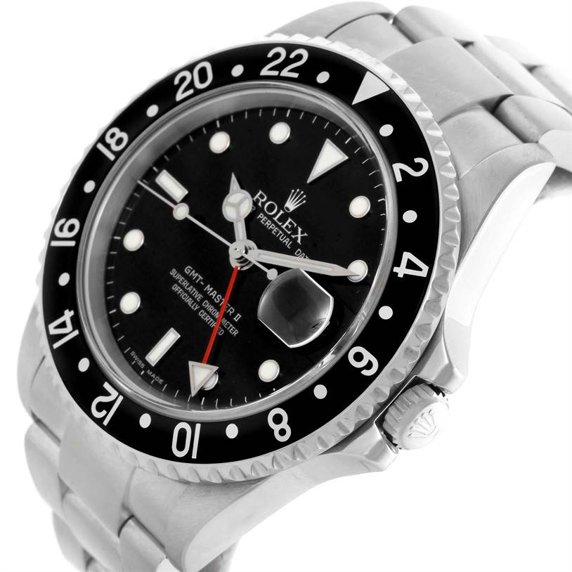 The image shows a top-side angle view of a Rolex GMT-Master 16710 Men's Stainless Steel Black Dial 16710 Men's Stainless Steel Black Dial II watch, highlighting the bezel, dial, and bracelet.