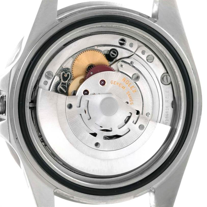 The image shows the exposed movement and internal components of a Rolex GMT-Master 16710 Men's Stainless Steel Black Dial 16710 Men's Stainless Steel Black Dial watch from a back angle.