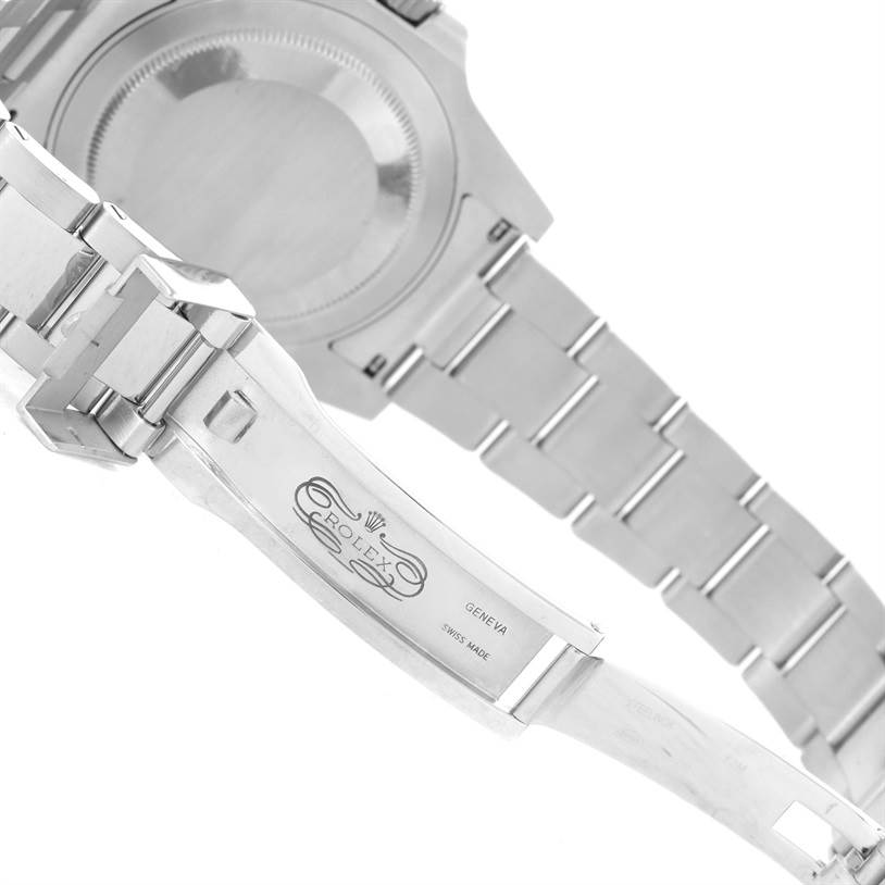 The image shows the underside of the Rolex GMT-Master 116710 Men's Stainless Steel Black Dial 116710 Men's Stainless Steel Black Dial watch, highlighting the case back, bracelet, and clasp with the Rolex logo.