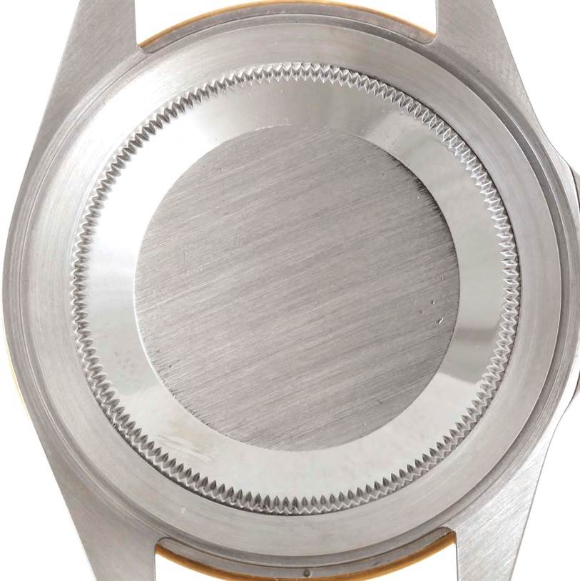 This is a close-up view of the back case of a Rolex GMT-Master 16713 Men's Stainless Steel Brown Dial 16713 Men's Stainless Steel Brown Dial watch.