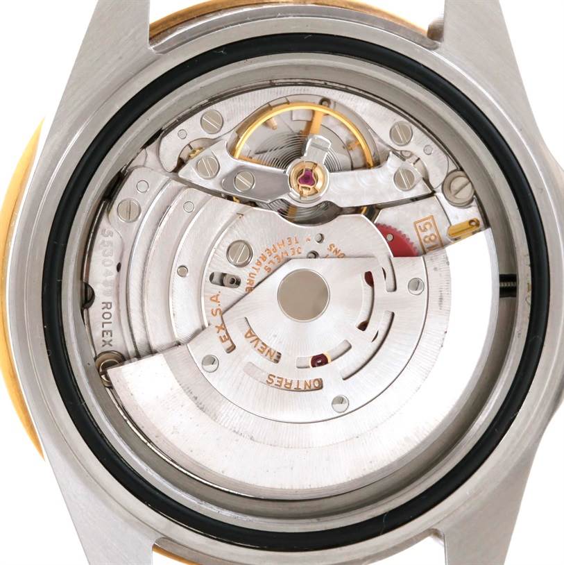 The image shows an internal view of the movement of a Rolex GMT-Master 16713 Men's Stainless Steel Brown Dial 16713 Men's Stainless Steel Brown Dial watch from the back.