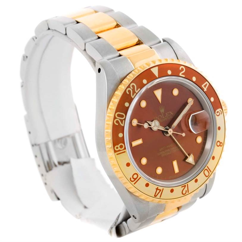 This image shows a side-angle view of a Rolex GMT-Master 16713 Men's Stainless Steel Brown Dial 16713 Men's Stainless Steel Brown Dial watch, highlighting the bezel, dial, and two-tone bracelet.