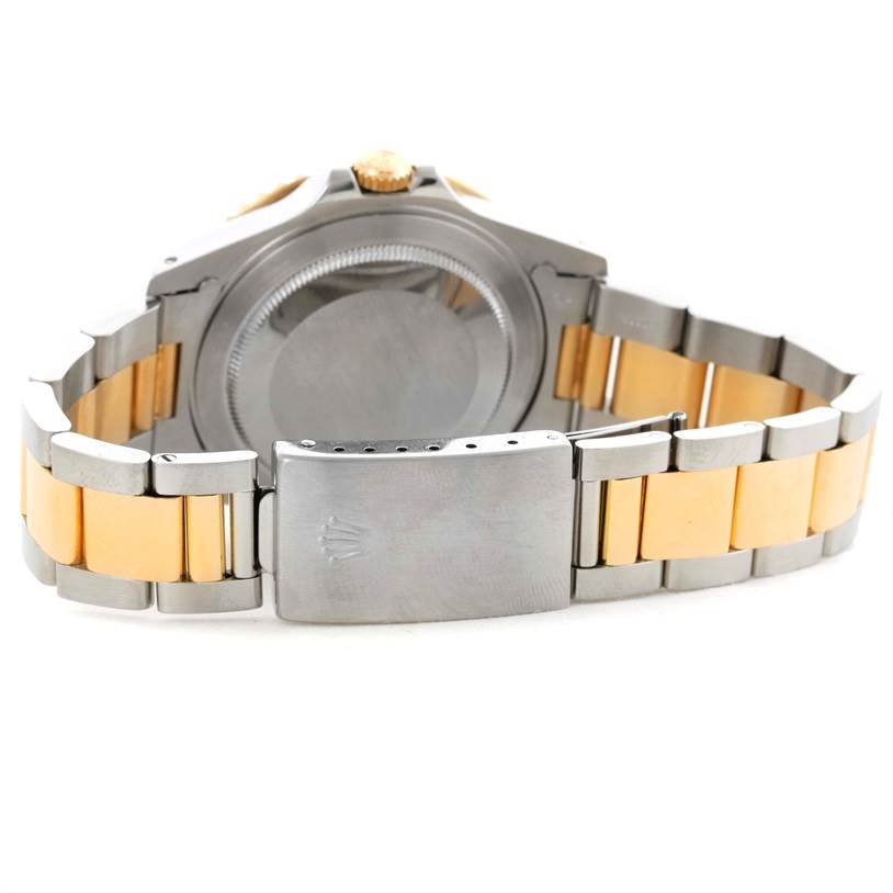 The image shows the back and clasp of a Rolex GMT-Master 16713 Men's Stainless Steel Brown Dial 16713 Men's Stainless Steel Brown Dial watch, highlighting its two-tone bracelet.