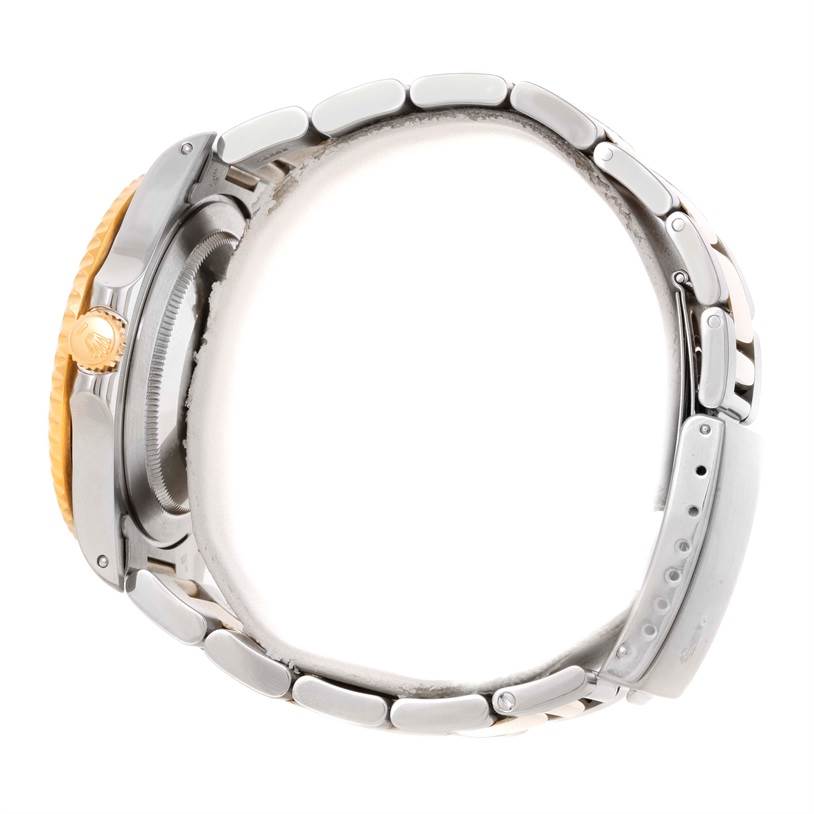 The image shows a side view of a Rolex GMT-Master 16713 Men's Stainless Steel Brown Dial 16713 Men's Stainless Steel Brown Dial watch, highlighting the bracelet, crown, and case.