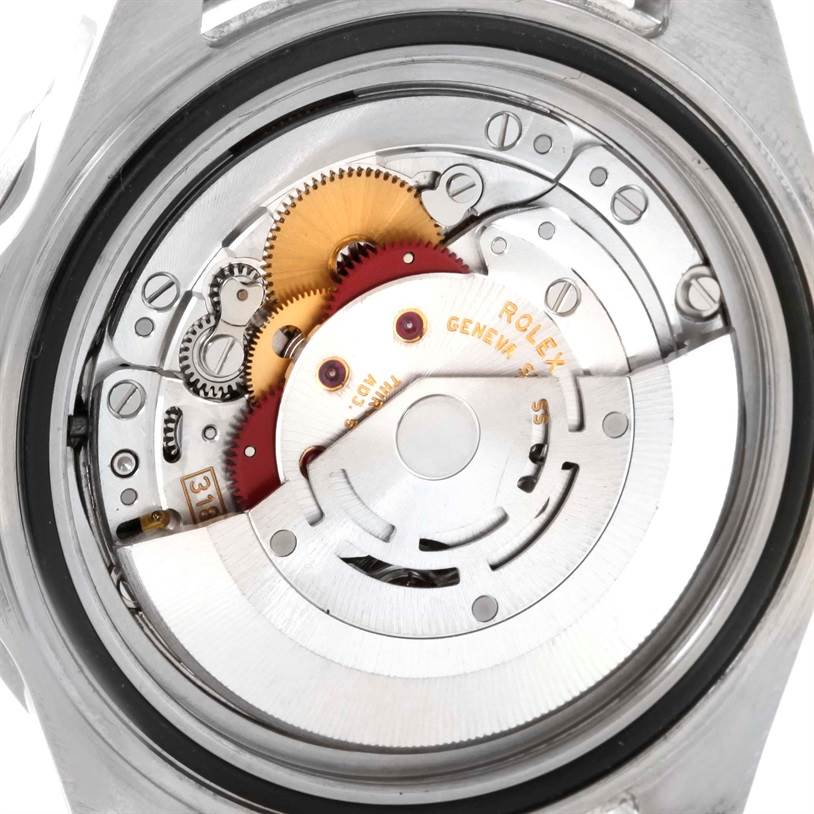 This image shows a close-up view of the inner mechanical movement of the Rolex GMT-Master 16710 Men
s Stainless Steel Black Dial 16710 Men
s Stainless Steel Black Dial watch, featuring gears and the rotor.