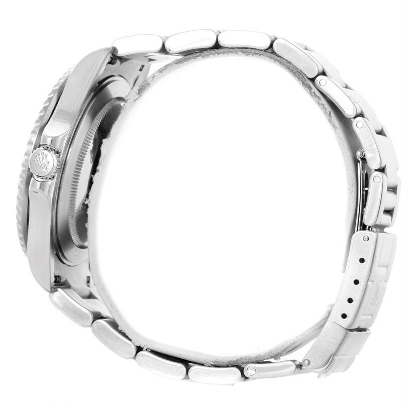 This image shows a side view of the Rolex GMT-Master 16710 Men
s Stainless Steel Black Dial 16710 Men
s Stainless Steel Black Dial watch, highlighting the crown, case, and metal bracelet.