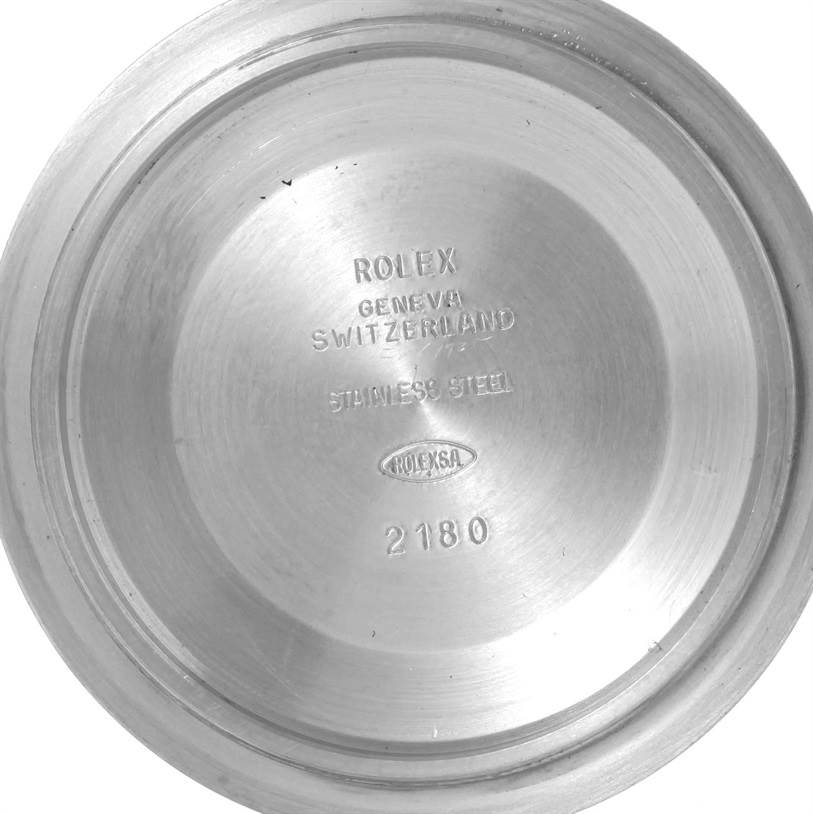 This image shows the inside case back of a Rolex GMT-Master 16710 Men
s Stainless Steel Black Dial 16710 Men
s Stainless Steel Black Dial watch, featuring engravings with the brand and model details.