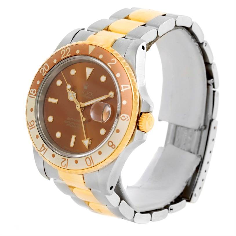 The image shows a Rolex GMT-Master 16713 Men's Stainless Steel Brown Dial 16713 Men's Stainless Steel Brown Dial watch from an angled side view, highlighting its two-tone bracelet and golden bezel.