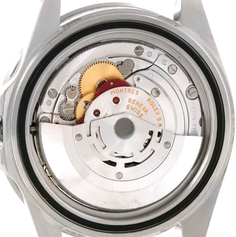 This is the back view of a Rolex GMT-Master 16710 Men's Stainless Steel Black Dial 16710 Men's Stainless Steel Black Dial, showing its intricate internal mechanical movement.