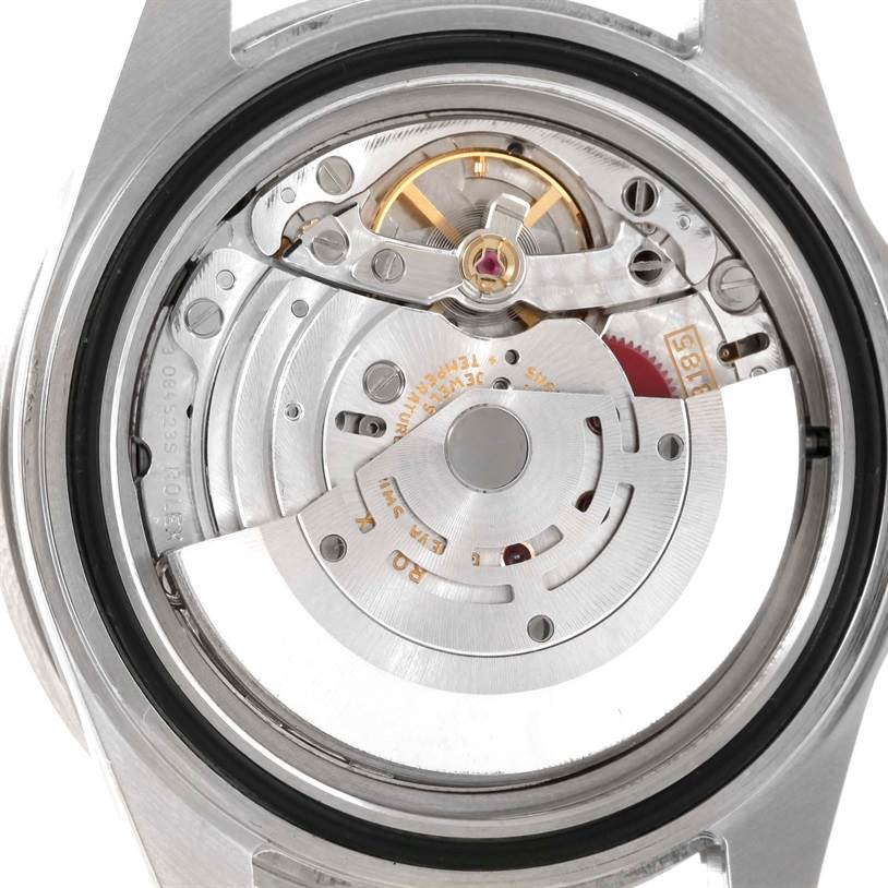 The image shows the internal movement mechanism of a Rolex GMT-Master 16710 Men's Stainless Steel Black Dial 16710 Men's Stainless Steel Black Dial watch, focusing on the rotor and balance wheel.