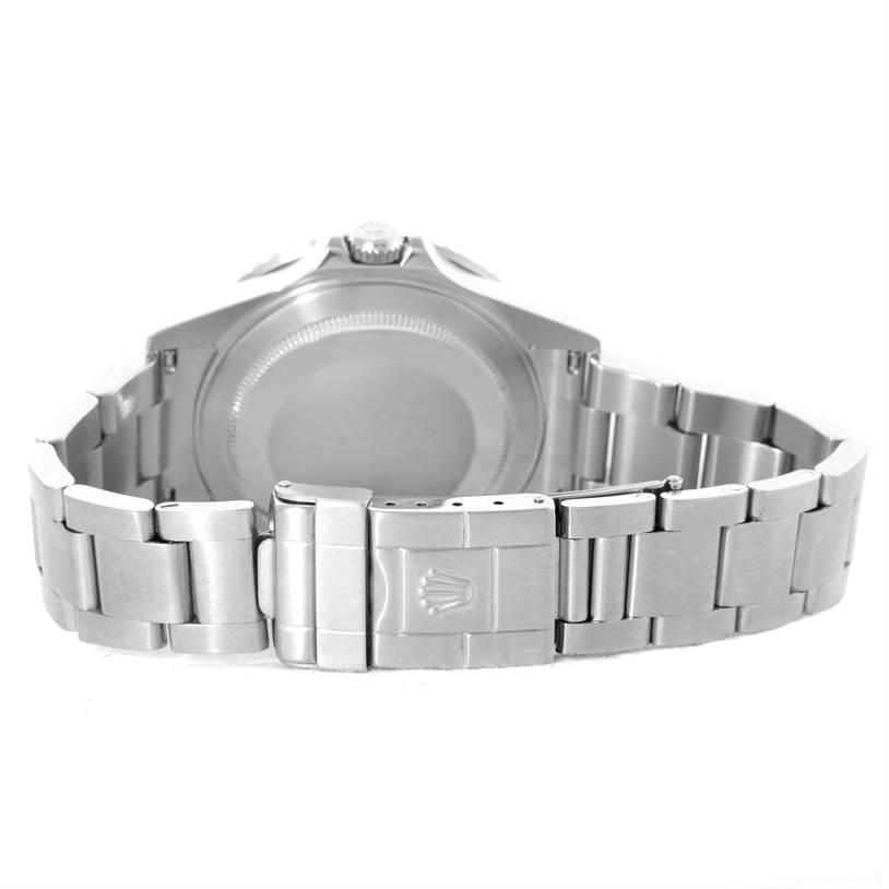 This image shows the back case and metal bracelet clasp of a Rolex GMT-Master 16710 Men's Stainless Steel Black Dial 16710 Men's Stainless Steel Black Dial watch from a rear angle.