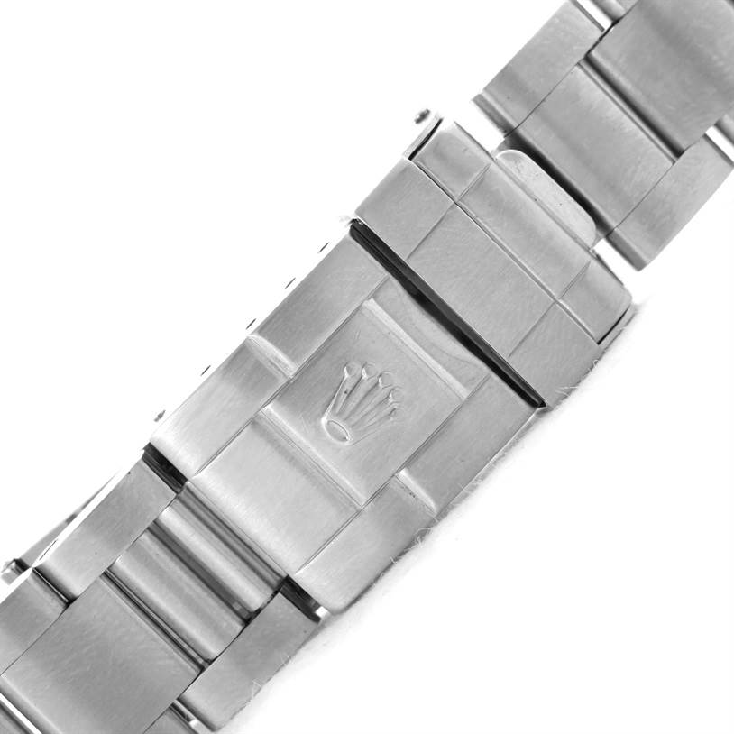 This image shows a close-up of the clasp and part of the stainless steel bracelet of a Rolex GMT-Master 16710 Men's Stainless Steel Black Dial 16710 Men's Stainless Steel Black Dial watch.