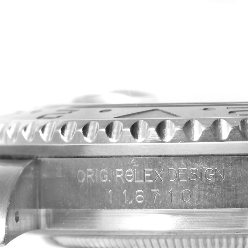 This image shows a close-up of the side and bezel of a Rolex GMT-Master 116710 Men's Stainless Steel Black Dial 116710 Men's Stainless Steel Black Dial watch, displaying the model number 116710.