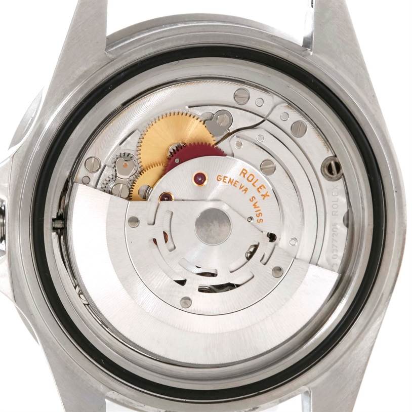 The image shows the backside of a Rolex GMT-Master 16710 Men's Stainless Steel Black Dial 16710 Men's Stainless Steel Black Dial watch, revealing its internal mechanical components and movement.