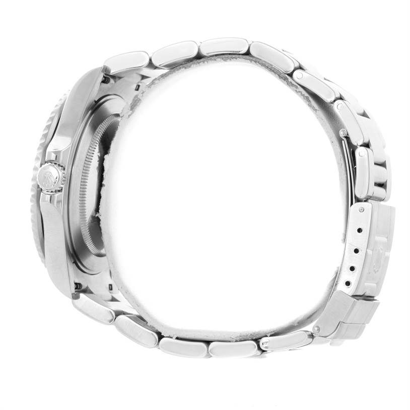 The image shows a side view of the Rolex GMT-Master 16710 Men's Stainless Steel Black Dial 16710 Men's Stainless Steel Black Dial watch emphasizing the case, crown, and bracelet.