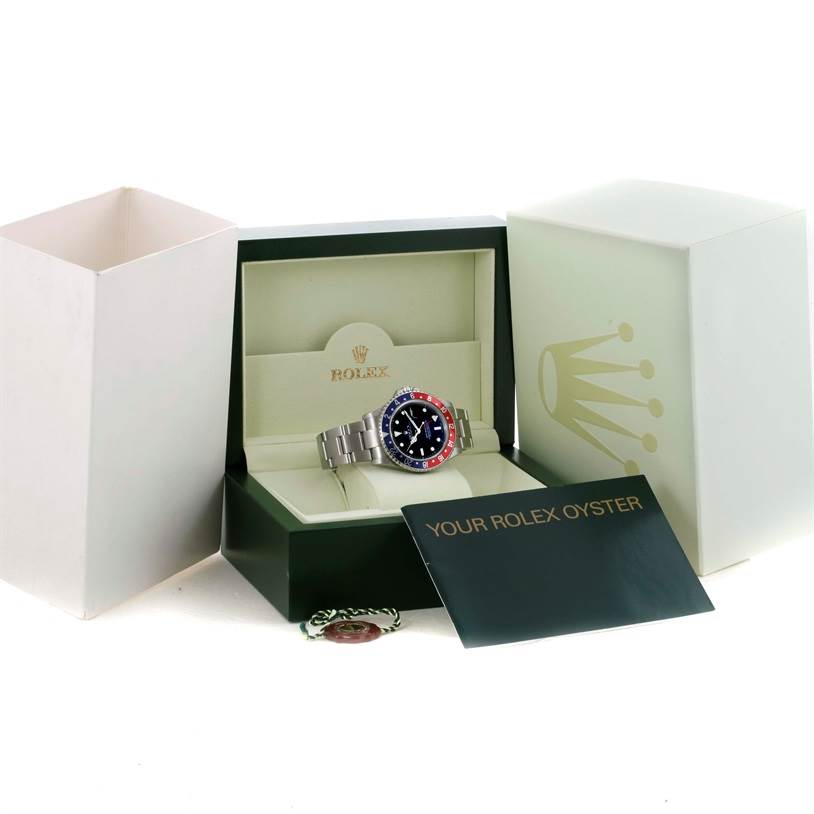 The Rolex GMT-Master 16710 Men's Stainless Steel Black Dial 16710 Men's Stainless Steel Black Dial watch is displayed inside its box along with the outer box and booklet, shown from a front angle.
