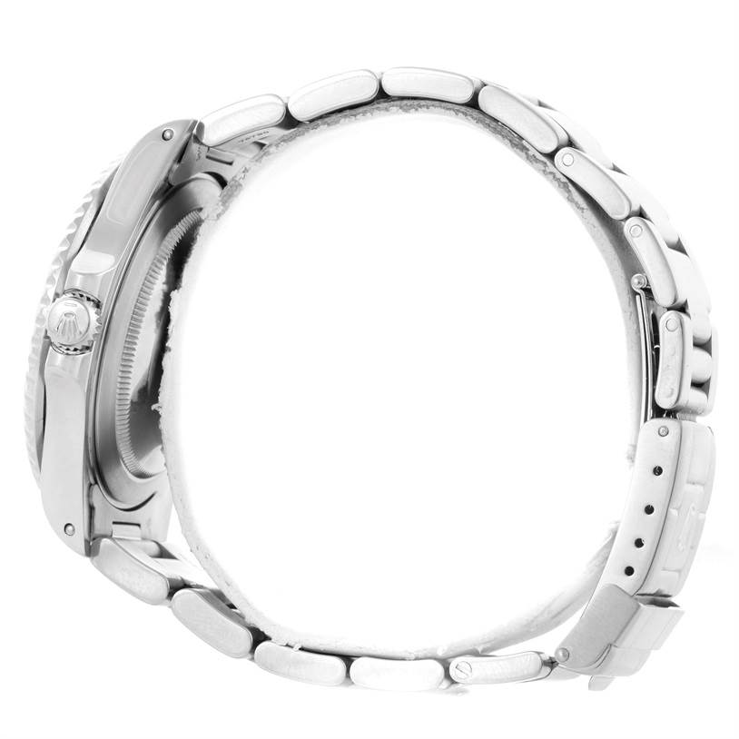 The image shows a side view of a Rolex GMT-Master 16710 Men's Stainless Steel Black Dial 16710 Men's Stainless Steel Black Dial watch, highlighting the crown, case, and part of the bracelet.