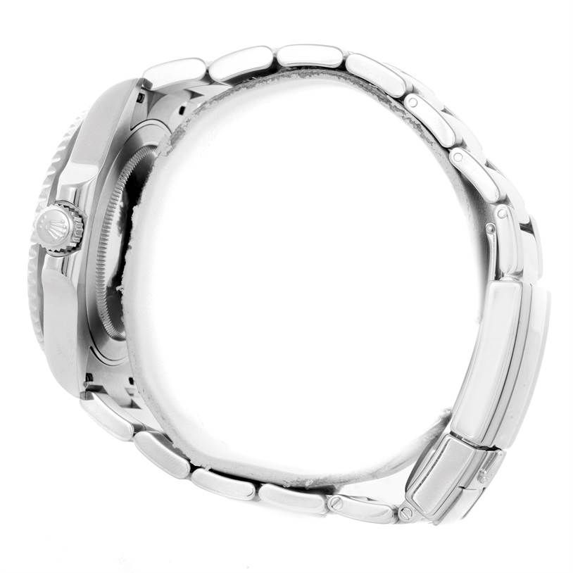 The image shows a side view of a Rolex GMT-Master 116710 Men
s Stainless Steel Black Dial 116710 Men
s Stainless Steel Black Dial watch, highlighting its crown, bezel, and bracelet.