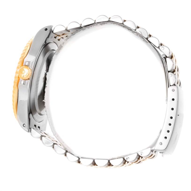 This image shows a side view of the Rolex GMT-Master 16713 Men's Stainless Steel Brown Dial 16713 Men's Stainless Steel Brown Dial watch, highlighting the crown and part of the bracelet.