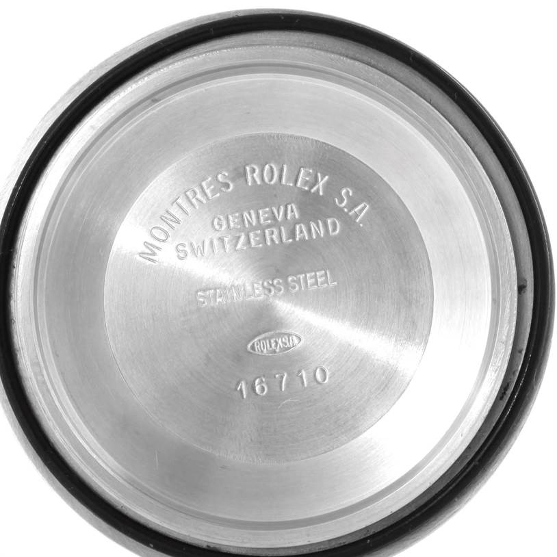 This image shows the inner case back of a Rolex GMT-Master 16713 Men's Stainless Steel Brown Dial 16713 Men's Stainless Steel Brown Dial watch, model 16710, inscribed with branding and material details.