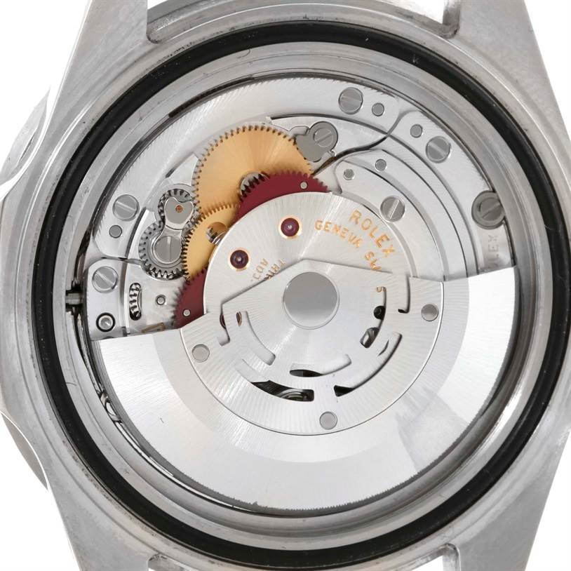 This is the back view of a Rolex GMT-Master 16710 Men's Stainless Steel Black Dial 16710 Men's Stainless Steel Black Dial watch showing its intricate internal mechanical movement.