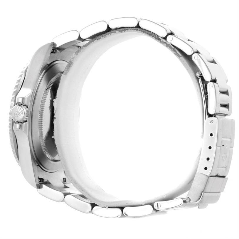 The image shows the side of the Rolex GMT-Master 16710 Men's Stainless Steel Black Dial 16710 Men's Stainless Steel Black Dial watch, highlighting the case, crown, and bracelet with clasp.