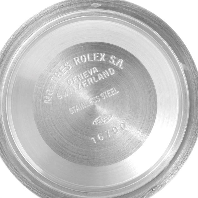 The image shows the inside case back of a Rolex GMT-Master 16700 Men's Stainless Steel Black Dial 16700 Men's Stainless Steel Black Dial, model 16700, highlighting the stainless steel composition and origin.