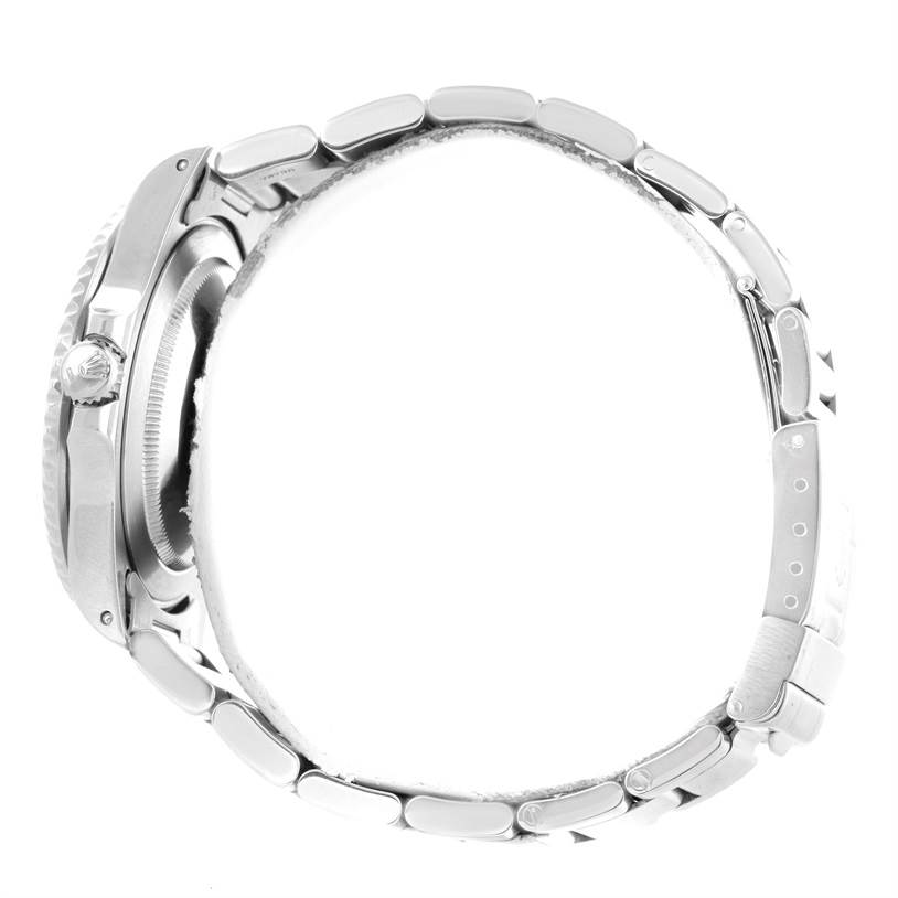 The image shows a side profile of a Rolex GMT-Master 16700 Men's Stainless Steel Black Dial 16700 Men's Stainless Steel Black Dial watch, detailing its crown and bracelet.