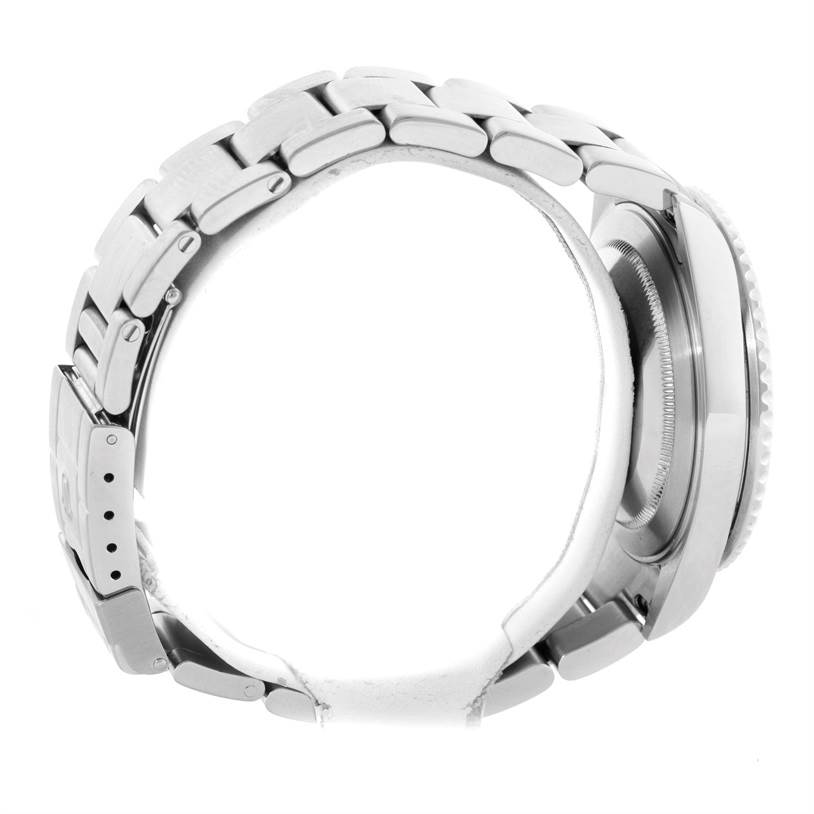 This image shows the left side view of the case, crown, and bracelet of a Rolex GMT-Master 16710 Men's Stainless Steel Black Dial 16710 Men's Stainless Steel Black Dial watch.