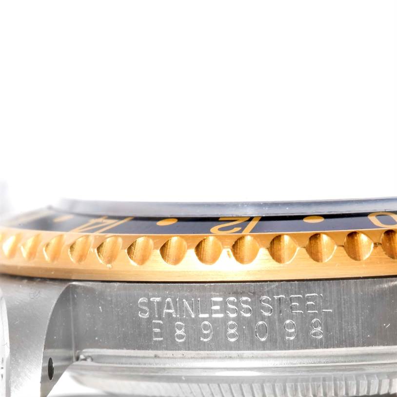 This close-up image displays the bezel and case side of a Rolex GMT-Master 16713 Men
s Stainless Steel Black Dial 16713 Men
s Stainless Steel Black Dial watch.