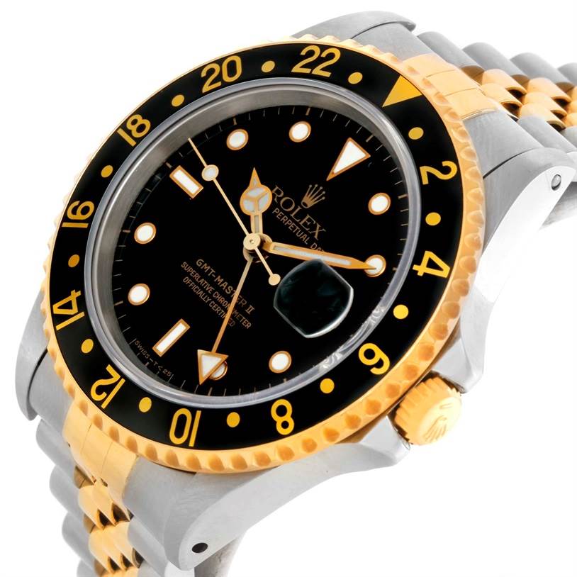 The image shows a close-up angled view of the Rolex GMT-Master 16713 Men
s Stainless Steel Black Dial 16713 Men
s Stainless Steel Black Dial, highlighting its bezel, dial, crown, and part of the bracelet.