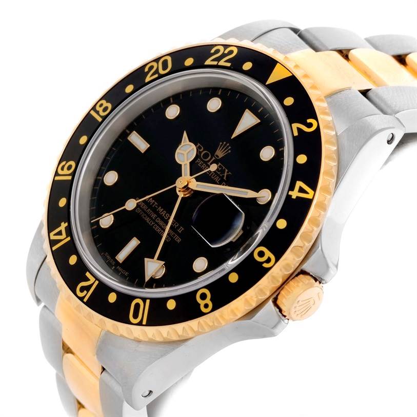 The image shows a close-up, angled view of a Rolex GMT-Master 16713 Men's Stainless Steel Black Dial 16713 Men's Stainless Steel Black Dial II, highlighting the bezel, dial, case, and two-tone bracelet.