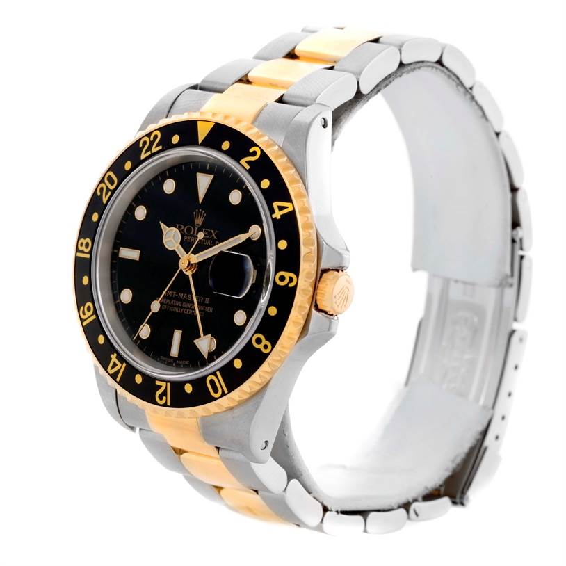 The Rolex GMT-Master 16713 Men's Stainless Steel Black Dial 16713 Men's Stainless Steel Black Dial watch is shown at a three-quarter angle, highlighting the face, bezel, and two-tone bracelet.