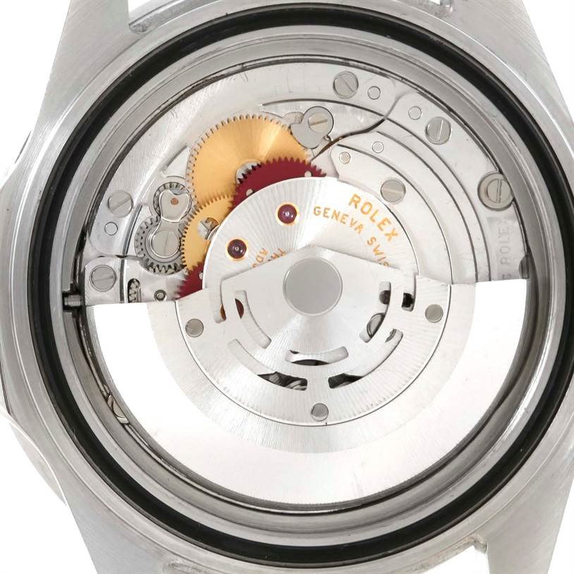 The image shows the intricate mechanical movement of a Rolex GMT-Master 16710 Men's Stainless Steel Black Dial 16710 Men's Stainless Steel Black Dial watch from a rear view perspective.