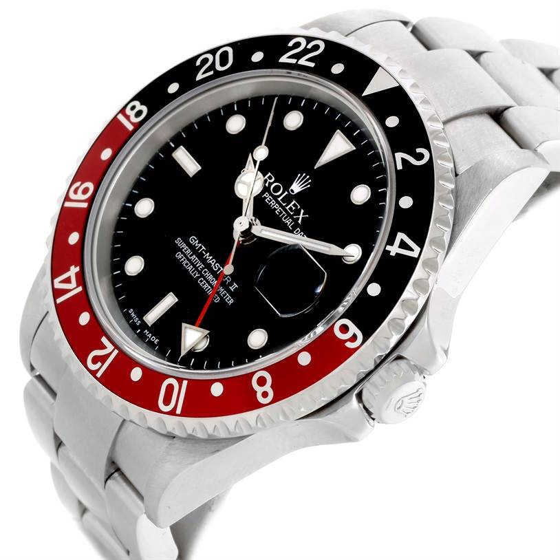 This image shows a tilted top-side view of a Rolex GMT-Master 16710 Men's Stainless Steel Black Dial 16710 Men's Stainless Steel Black Dial II watch, displaying the dial, bezel, bracelet, and crown.