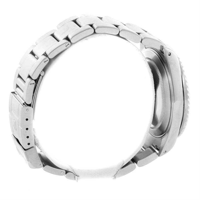 The image shows a side view of a Rolex GMT-Master 16710 Men's Stainless Steel Black Dial 16710 Men's Stainless Steel Black Dial watch, focusing on the metal bracelet and the back of the watch case.