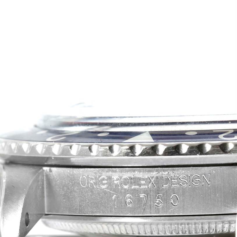This image shows a close-up side view of a Rolex GMT-Master 16750 Men's Stainless Steel Black Dial 16750 Men's Stainless Steel Black Dial watch, highlighting the bezel and case with the "ORG ROLEX DESIGN" engraving and model number 16750.