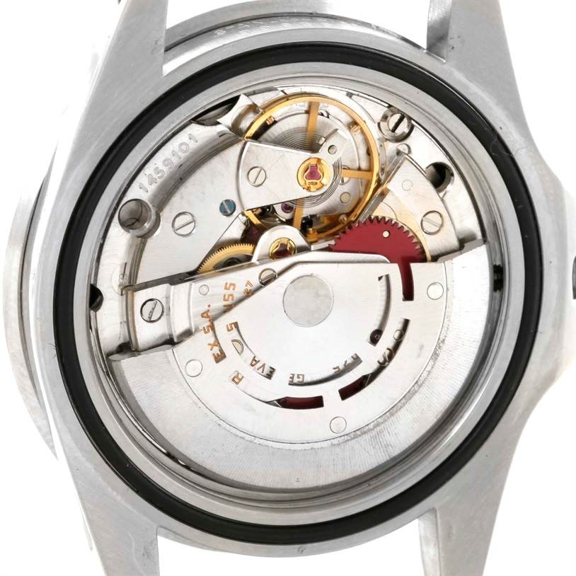 This image shows the movement and inner mechanisms of a Rolex GMT-Master 16750 Men's Stainless Steel Black Dial 16750 Men's Stainless Steel Black Dial watch from a rear angle with the case back removed.